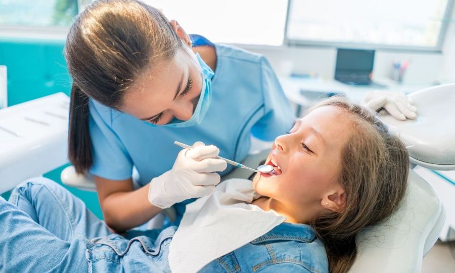 Child having a dental check-up at the dentist